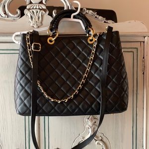 Lavorazione Italian leather quilted hand bag. New